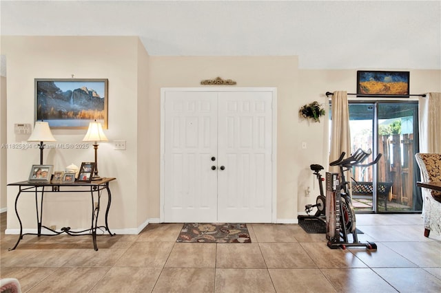 11027 SW 148th Ct, Miami, FL 33196 - foyer featuring baseboards and tile patterned floors