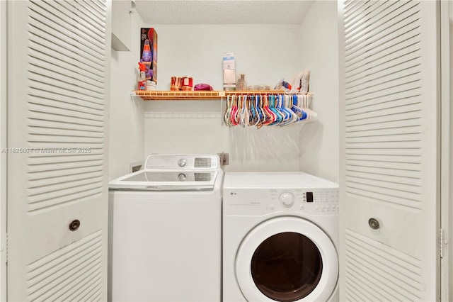 11027 SW 148th Ct, Miami, FL 33196 - washroom with independent washer and dryer and a textured ceiling