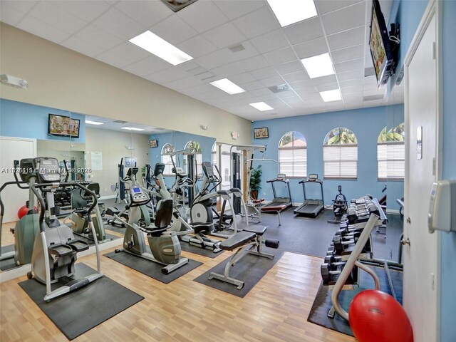 14111 SW 49th St Unit 8, Miramar, FL 33027 - workout area with a paneled ceiling and wood finished floors