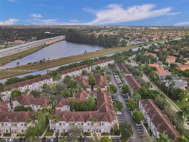 14111 SW 49th St Unit 8, Miramar, FL 33027 - aerial overview of property's location with a nearby body of water, a notable bridge, and nearby suburban area