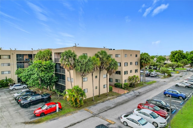 8635 NW 8th St Unit 103, Miami, FL 33126 - view of apartment building / complex with uncovered parking
