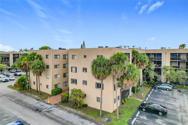8635 NW 8th St Unit 103, Miami, FL 33126 - view of apartment building / complex with uncovered parking