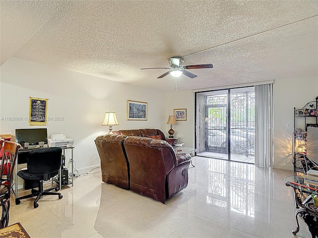 8635 NW 8th St Unit 103, Miami, FL 33126 - living area with a ceiling fan, an office area, a textured ceiling, and expansive windows