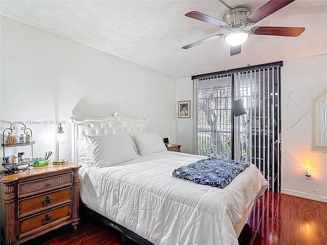 8635 NW 8th St Unit 103, Miami, FL 33126 - bedroom with dark wood-style floors and ceiling fan