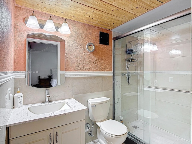 8635 NW 8th St Unit 103, Miami, FL 33126 - full bath featuring wood ceiling, a textured wall, a shower stall, vanity, and tile walls