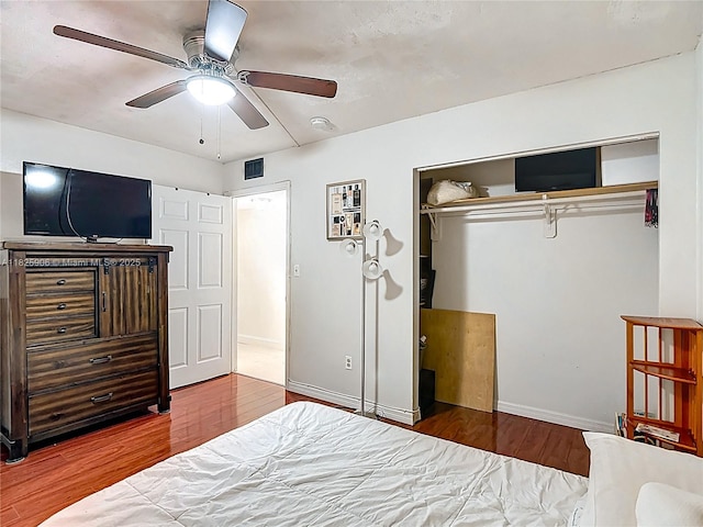 8635 NW 8th St Unit 103, Miami, FL 33126 - bedroom featuring a closet, wood finished floors, and ceiling fan