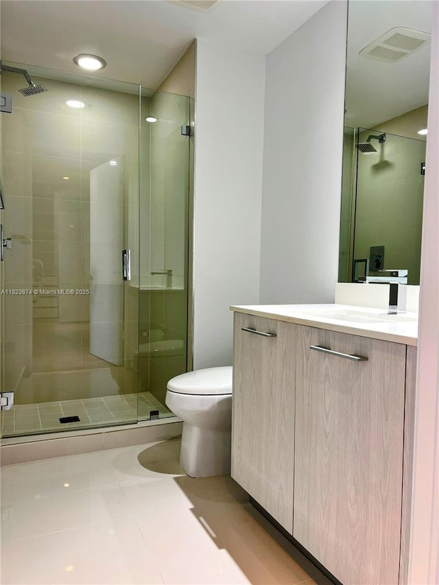 45 SW 9th St Unit 3602, Miami, FL 33130 - full bathroom featuring vanity, a stall shower, and tile patterned floors