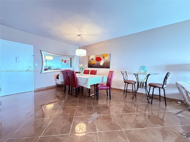1950 S Ocean Dr Phh, Phh, Hallandale Beach, FL 33009 - tiled dining room featuring a chandelier