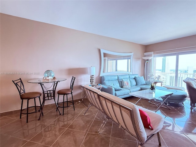 1950 S Ocean Dr Phh, Phh, Hallandale Beach, FL 33009 - tiled living room featuring baseboards