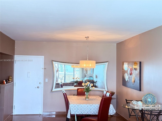 1950 S Ocean Dr Phh, Phh, Hallandale Beach, FL 33009 - dining room featuring a chandelier and baseboards