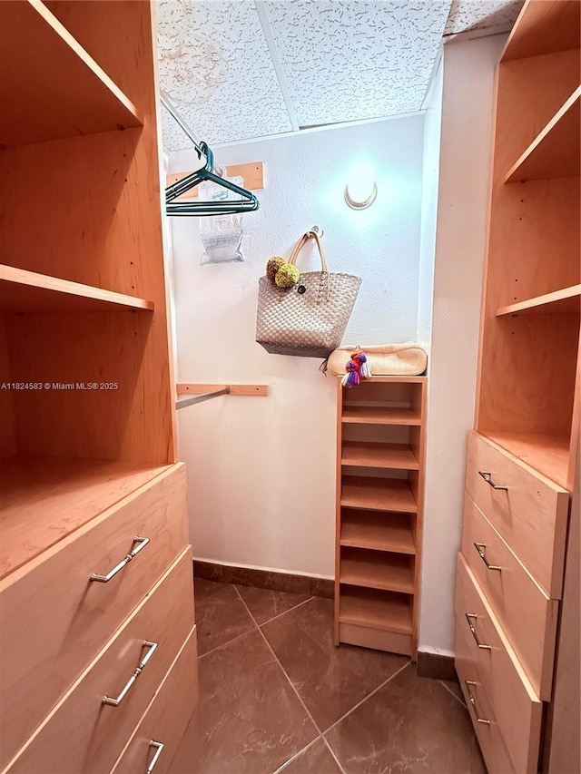 1950 S Ocean Dr Phh, Phh, Hallandale Beach, FL 33009 - walk in closet with dark tile patterned flooring