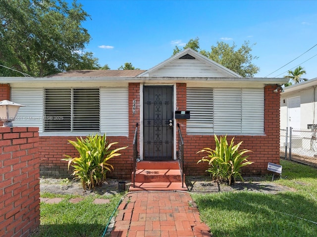 3490 Charles Ave, Miami, FL 33133 - view of front of home with brick siding
