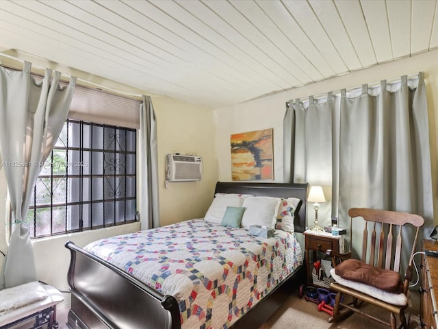 3490 Charles Ave, Miami, FL 33133 - bedroom featuring a wall mounted air conditioner and wood ceiling