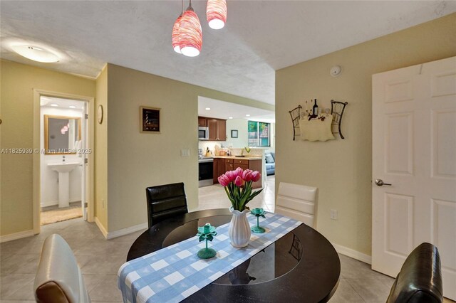 7100 NW 17th St Unit 402, Plantation, FL 33313 - dining space with light tile patterned floors