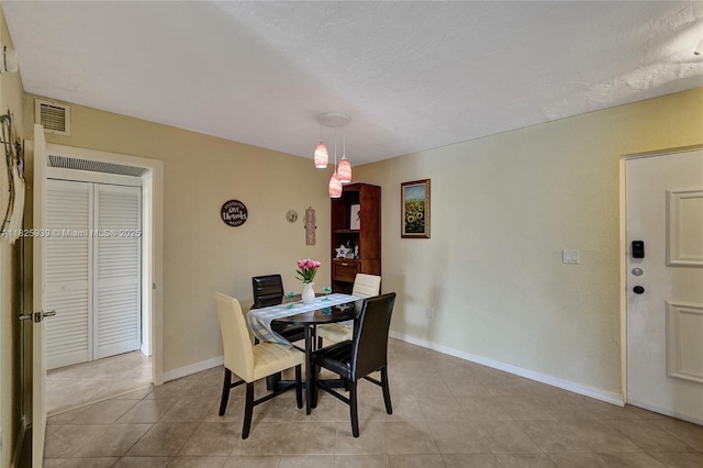 7100 NW 17th St Unit 402, Plantation, FL 33313 - dining space with light tile patterned flooring