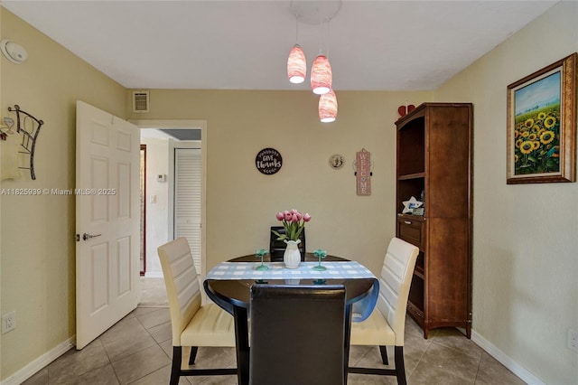 7100 NW 17th St Unit 402, Plantation, FL 33313 - tiled dining area with baseboards