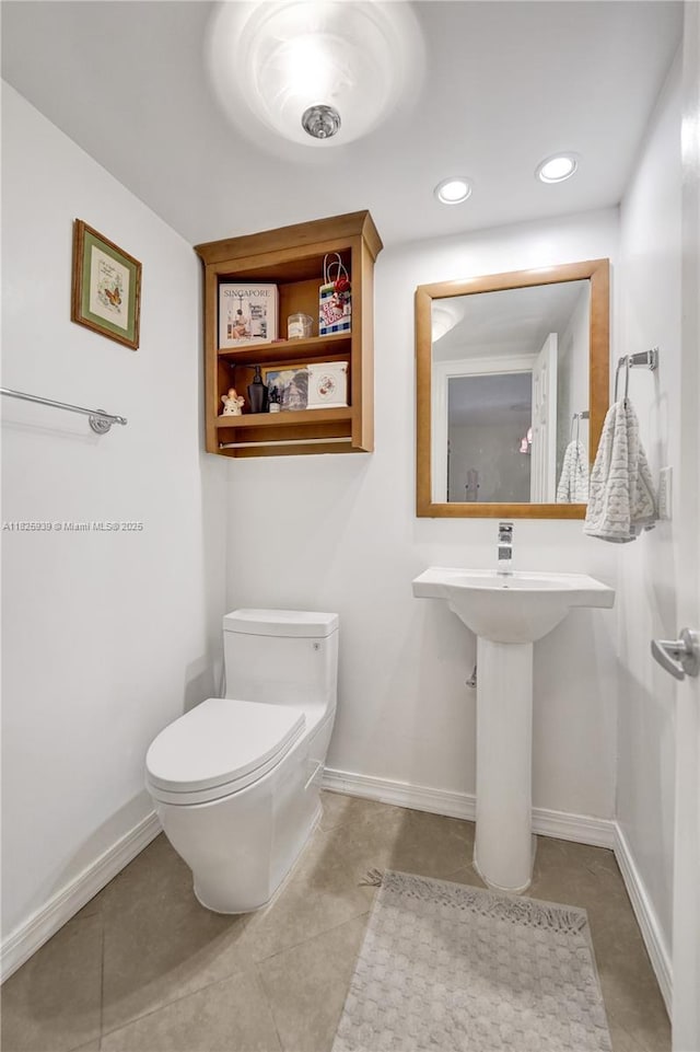 7100 NW 17th St Unit 402, Plantation, FL 33313 - bathroom featuring tile patterned floors and recessed lighting