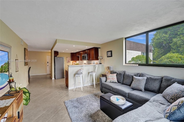 7100 NW 17th St Unit 402, Plantation, FL 33313 - living room with light tile patterned flooring