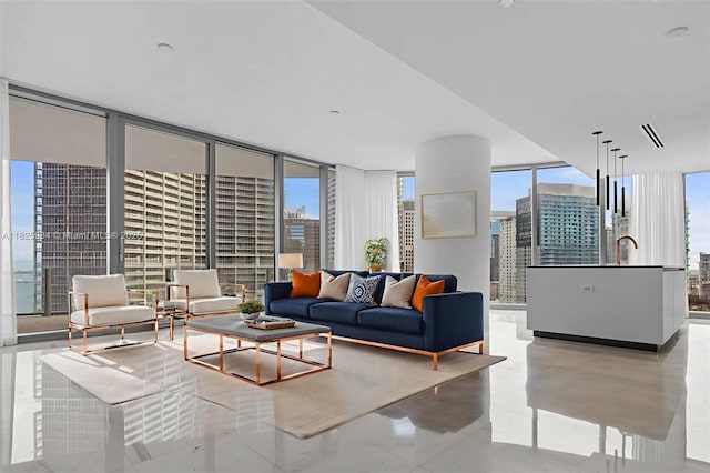 300 Biscayne Blvd Way Unit 2607, Miami, FL 33131 - living area featuring floor to ceiling windows, a view of city, and plenty of natural light