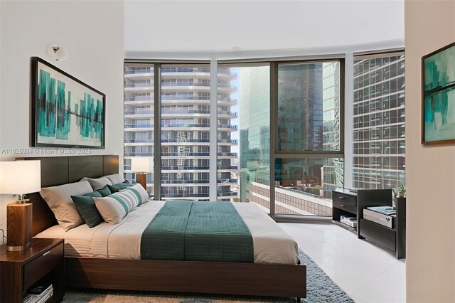 300 Biscayne Blvd Way Unit 2607, Miami, FL 33131 - bedroom with expansive windows and tile patterned floors