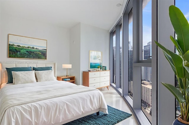 300 Biscayne Blvd Way Unit 2607, Miami, FL 33131 - bedroom with wood finished floors and a wall of windows