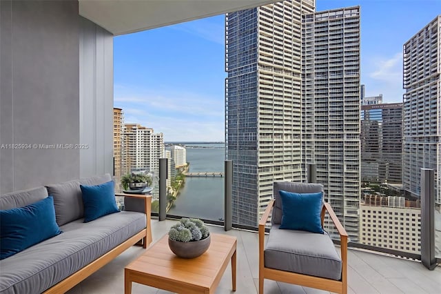 300 Biscayne Blvd Way Unit 2607, Miami, FL 33131 - balcony featuring outdoor lounge area, a water view, and a city view