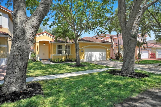 12779 SW 27th St, Miramar, FL 33027 - view of front of house with stucco siding, a tile roof, a garage, a front yard, and driveway