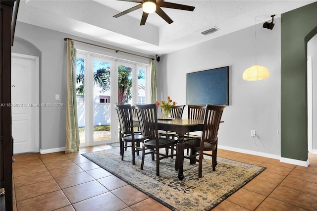 12779 SW 27th St, Miramar, FL 33027 - dining room with ceiling fan, tile patterned floors, and a textured ceiling