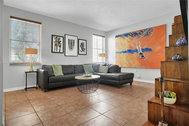 12779 SW 27th St, Miramar, FL 33027 - living room with a textured ceiling and light tile patterned flooring