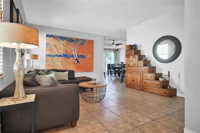 12779 SW 27th St, Miramar, FL 33027 - living area with a ceiling fan, light tile patterned floors, and a textured ceiling