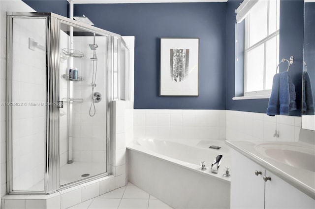12779 SW 27th St, Miramar, FL 33027 - full bath with a shower stall, a garden tub, tile patterned floors, and vanity