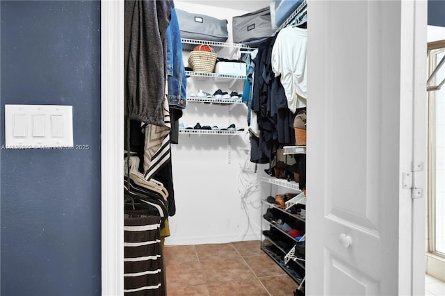 12779 SW 27th St, Miramar, FL 33027 - walk in closet with tile patterned floors