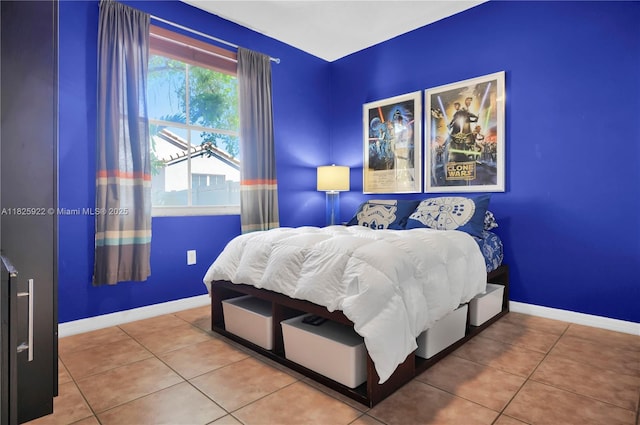 12779 SW 27th St, Miramar, FL 33027 - bedroom with tile patterned floors and baseboards
