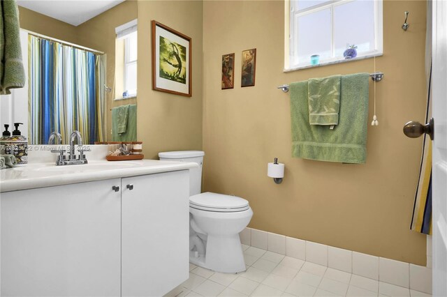 12779 SW 27th St, Miramar, FL 33027 - bathroom with vanity, tile patterned flooring, and a shower with shower curtain