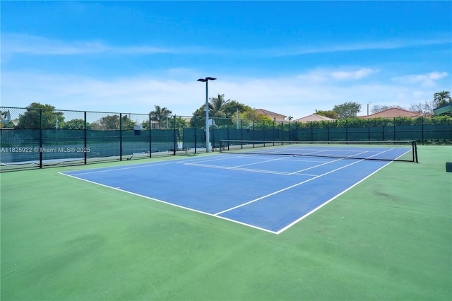 12779 SW 27th St, Miramar, FL 33027 - view of tennis court featuring community basketball court