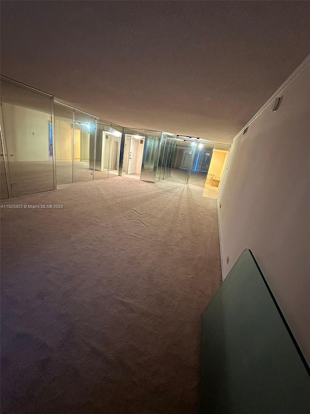 6039 Collins Ave Unit 1625, Miami Beach, FL 33140 - spare room featuring carpet flooring