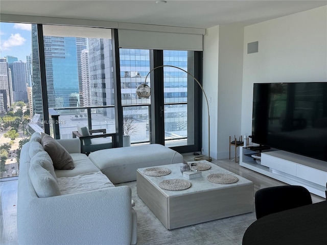 1451 Brickell Ave Unit 2306, Miami, FL 33131 - living area featuring expansive windows and a city view