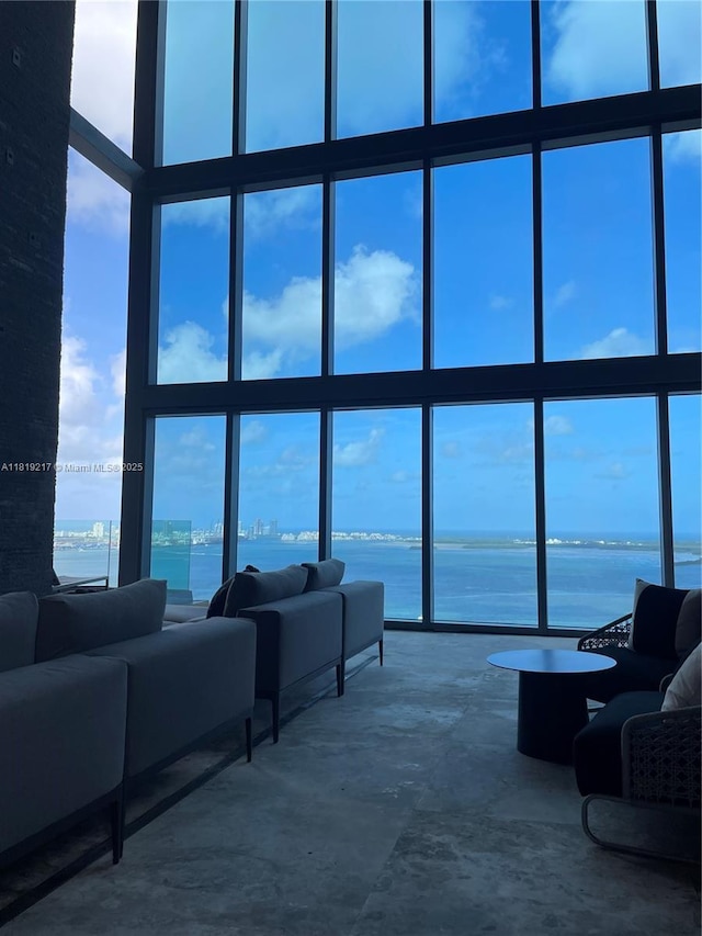 1451 Brickell Ave Unit 2306, Miami, FL 33131 - living area with a water view and a towering ceiling
