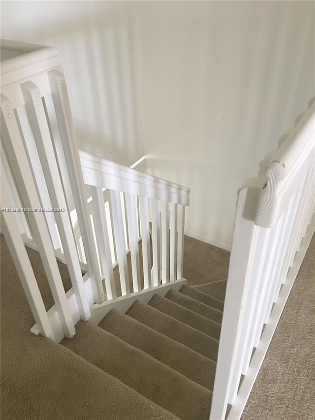 2233 SE 24th Pl Unit 2233, Homestead, FL 33035 - stairway featuring carpet flooring