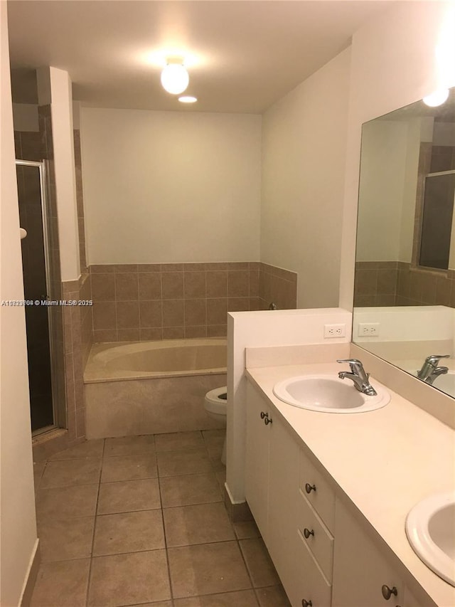 2233 SE 24th Pl Unit 2233, Homestead, FL 33035 - full bathroom with tile patterned flooring, a garden tub, a stall shower, and double vanity