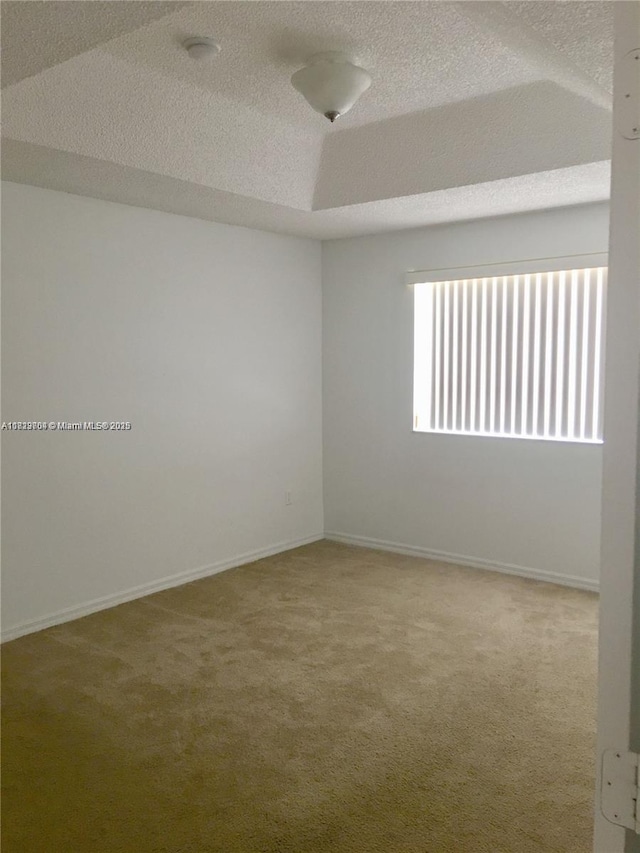 2233 SE 24th Pl Unit 2233, Homestead, FL 33035 - spare room featuring carpet flooring and a textured ceiling