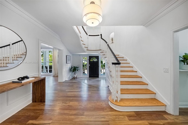 441 Grand Concourse, Miami Shores, FL 33138 - foyer entrance featuring stairway, wood finished floors, and ornamental molding
