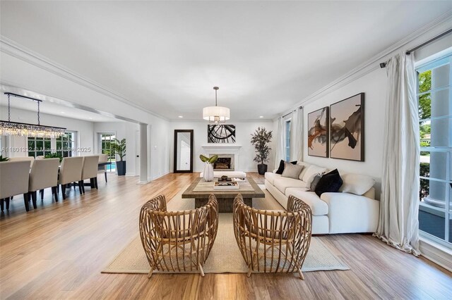 441 Grand Concourse, Miami Shores, FL 33138 - living area featuring wood finished floors, a fireplace, crown molding, and recessed lighting