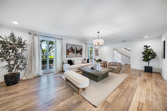 441 Grand Concourse, Miami Shores, FL 33138 - living room featuring stairs, crown molding, light wood-style flooring, and recessed lighting