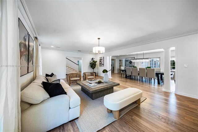 441 Grand Concourse, Miami Shores, FL 33138 - living area with stairs, ornamental molding, wood finished floors, ornate columns, and recessed lighting