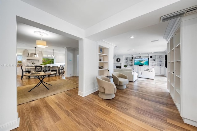 441 Grand Concourse, Miami Shores, FL 33138 - living area with wood finished floors, built in features, and recessed lighting