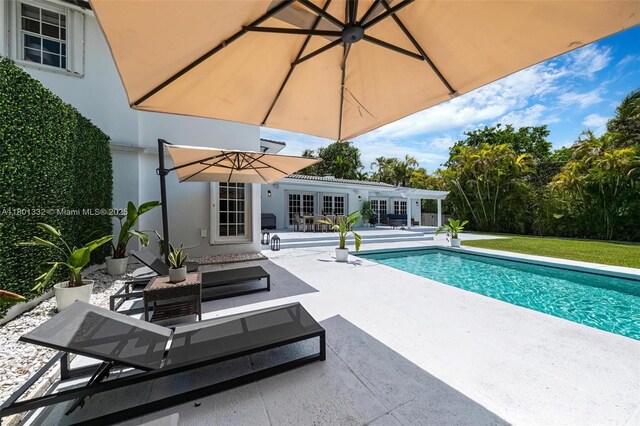 441 Grand Concourse, Miami Shores, FL 33138 - outdoor pool featuring a patio area and an outdoor hangout area
