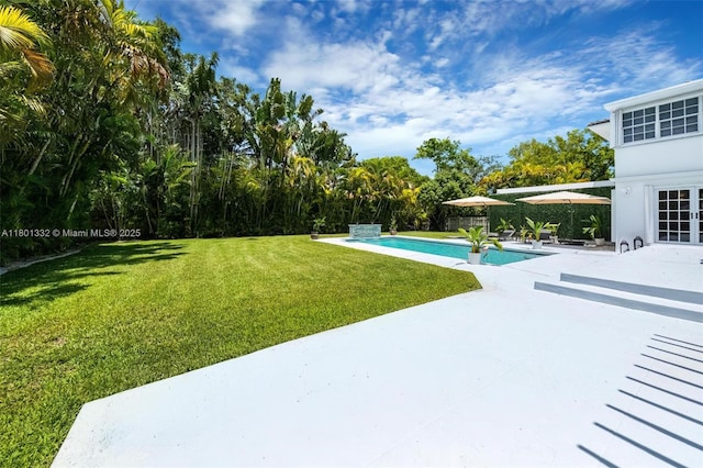 441 Grand Concourse, Miami Shores, FL 33138 - view of green lawn featuring a patio and an outdoor pool