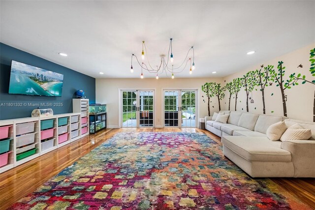 441 Grand Concourse, Miami Shores, FL 33138 - living area with wood finished floors, french doors, recessed lighting, and a chandelier