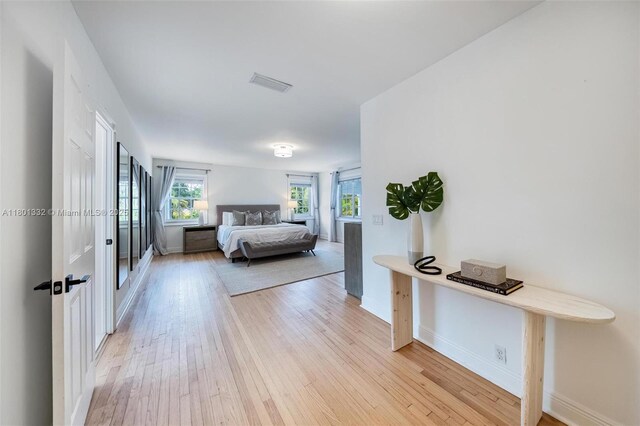 441 Grand Concourse, Miami Shores, FL 33138 - bedroom with baseboards and light wood-style flooring